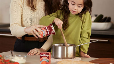 family-preparing soup