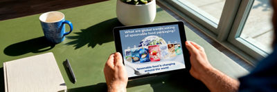 Person viewing Tetra Reva spoonable food insights on a tablet.