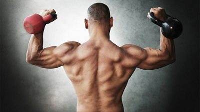 A strong man lifting heavy weights