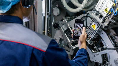 Technician connected to remote support via phone