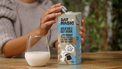 Oat based drink and tethered cap on carton package