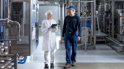 employees walking around in factory