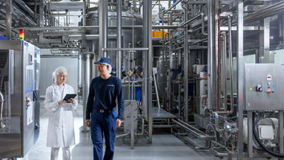 People walking in production hall