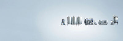 A variety of Tetra Pak machines lined up in a row