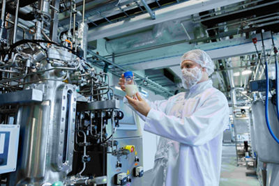 Food scientist check a product