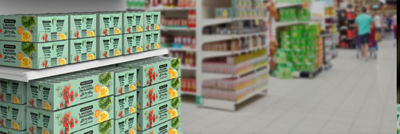 Woman in store with package in hand