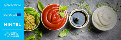 Pouring sauce on fine dining dish in bowl