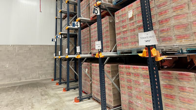 Pallets of “Tomate Frito” in aseptic cartons from Tetra Pak in a food bank warehouse in Madrid. 