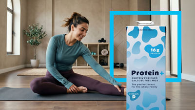 Woan doing sit-ups, protein drink in Tetra Pak carton package