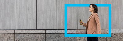 Woman walking, coffee drink