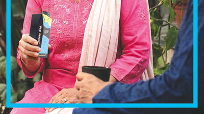 Woman holding protein drink