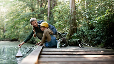 Woman and boy fishing
