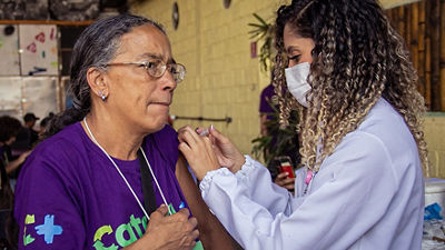 Woman receiving vaccine