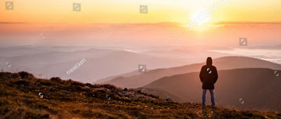 a person in a sunset