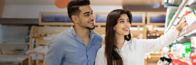 Young couple shopping groceries