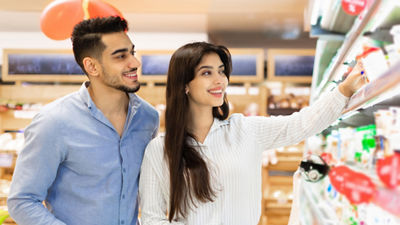 Young couple shopping groceries