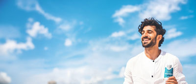 Happy man and a Tetra Prisma Aseptic carton