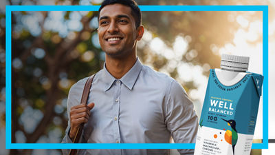 Young man with backpack, protein drink in Tetra Prisma Aseptic carton 