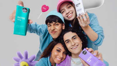 Young people with Hatsu tea packages