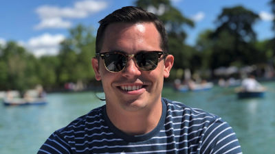 Man with harbour background