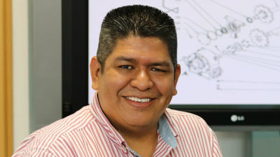 Man smiling looking at the camera