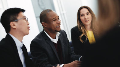 Men and women in meeting