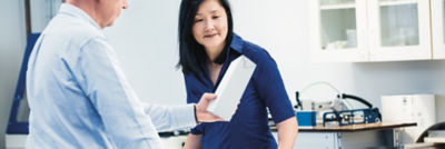 Two people and carton packaging