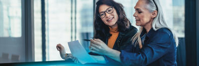 Women with computer discussing