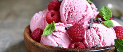 Raspberry ice cream in bowl