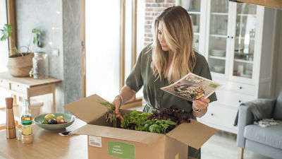 Woman unpacking groceries