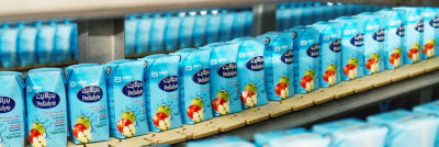 Tetra Prisma Aseptic carton packages on distribution line, Al Rabie apple juice
