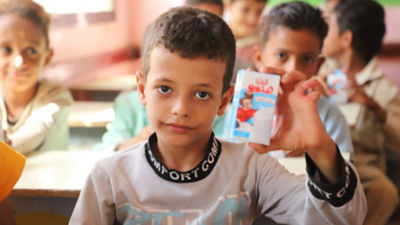 Boy in Yemen with Tetra Brik Aseptic