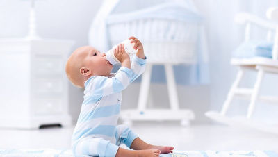 baby drinking from bottle