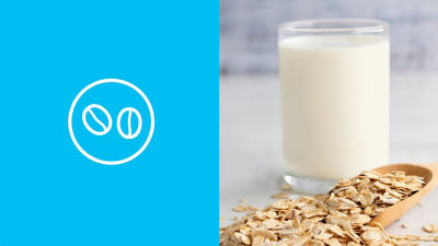 Blue background white icon oats and glass of oat drink