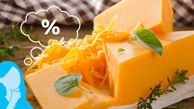 Cheddar on a rustic wooden background