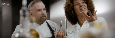 Chef and customer testing food at the Food development centre