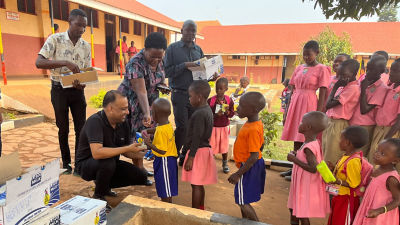 Children in line, receiving school milk