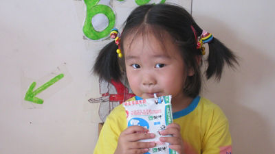 chinese girl drinking milk