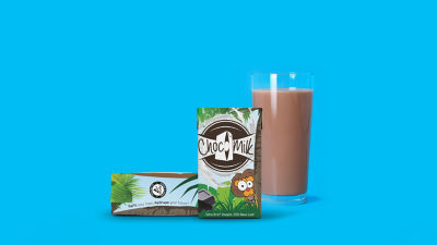 Chocolate milk in carton package and glass
