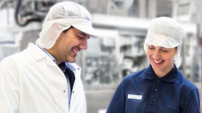 Co-packer and Tetra Pak staff at plant