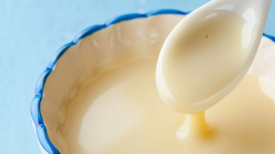 a bowl with condensed milk