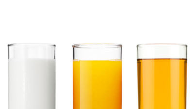 Glasses with juice and milk