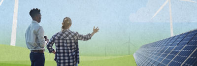 Couple, windmills and solar panels