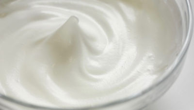 a bowl with whipped cream