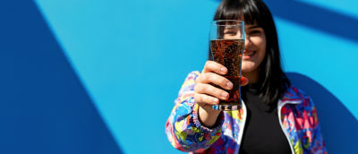 Woman with cola in glass