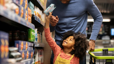 a girl and her dad shopping 