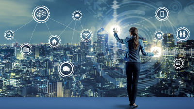 Woman interacting with digital dashboard