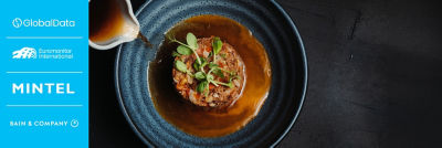 Pouring sauce on fine dining dish in bowl