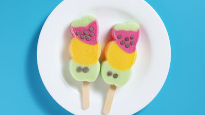 Extruded ice cream popsicles