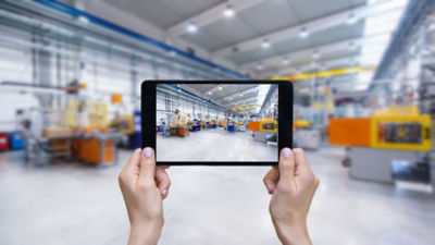 Viewing factory floor with tablet